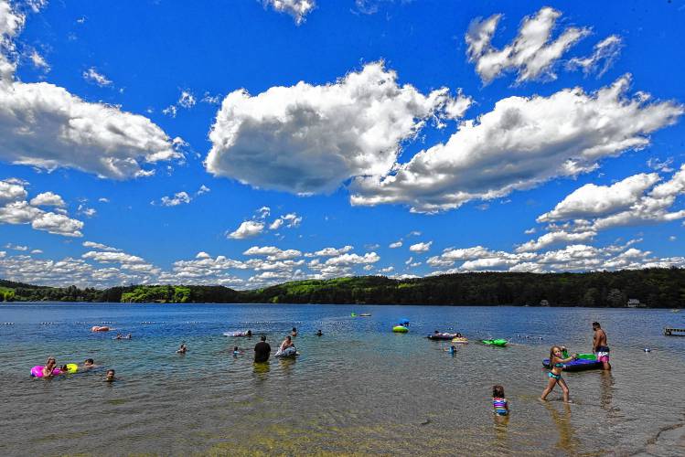 Swimmers at Lake Mattawa in Orange.