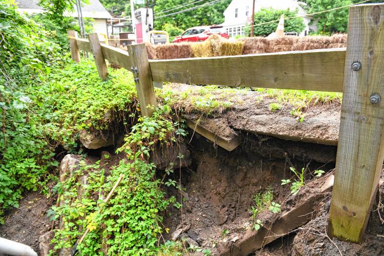 Recent heavy rains eroded the parking lot and crushed the septic system at Baker’s Country Store in Conway.