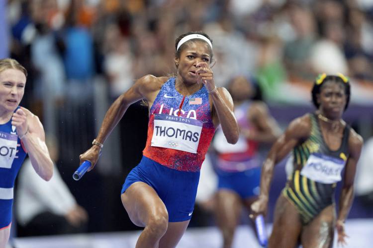 Florence’s Gabby Thomas, shown here during the 4x100 meter relay on Friday, ran a leg on the winning 4x400 relay team Saturday  at the 2024 Summer Olympic in Saint-Denis, France. Thomas finishes her Olympics with three gold medals.