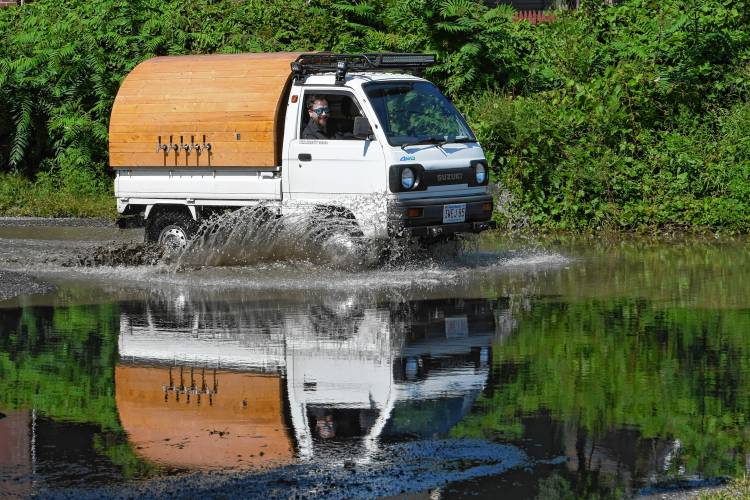 Montague resident Chad Champoux’s 1990 Suzuki Carry has been transformed into a brewery on wheels called the “KEIgerator.”