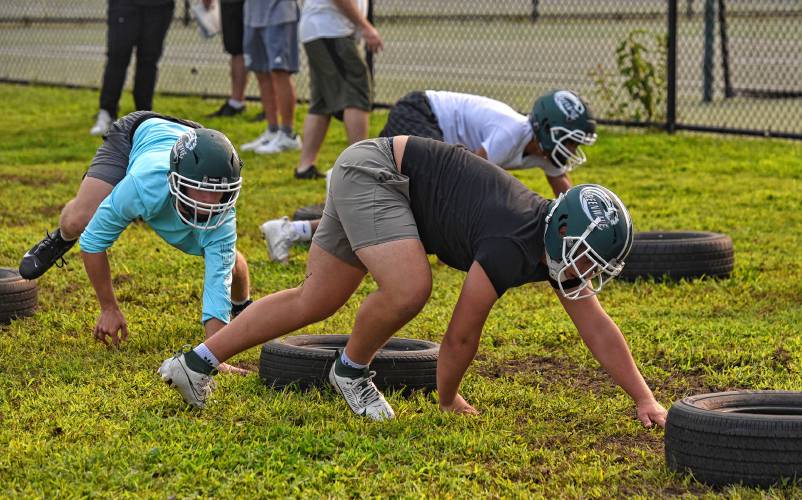 The Greenfield football team moves through conditioning drills during Day 1 of preseason camp on Friday in preparation for their 2024 season opener on Sept. 13 against Chicopee.