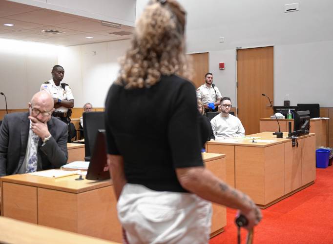 Kathleen “Kay” Doherty, who lost her leg in the Northfield crash, shows defendant Ryan T. O’Farrell her prosthetic leg while giving her victim-impact statement in Franklin County Superior Court on Monday.