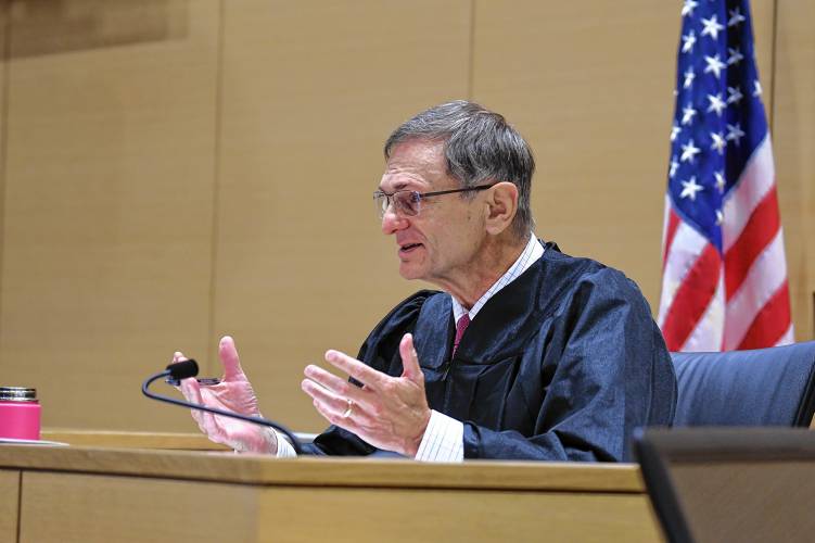 Judge John Agostini speaks to Ryan T. O’Farrell before sentencing him in Franklin County Superior Court on Monday.