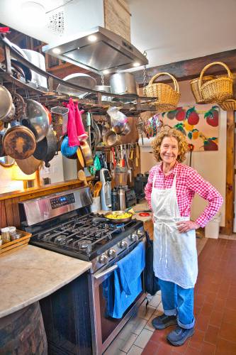 Jon Lagrèze purchased property in Colrain’s historical Foundry Village neighborhood that had housed various kinds of manufacturing over many decades, and set about repurposing some of the equipment he found there. From a conveyor apparatus, Lagrèze created a place to hang pots and pans so that his partner, Judith Roberts — whom he describes as a culinary artist — has easy access to equipment she needs while making magic in the kitchen.