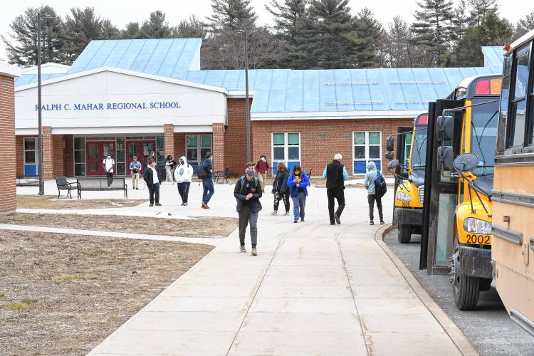 Students leaving Ralph C. Mahar Regional School in Orange.