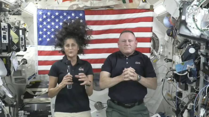 In this image from video provided by NASA, astronauts Sunita “Suni” Williams, left, and Bary “Butch” Wilmore give a news conference aboard the International Space Station on July 10. What was supposed to be an eight-day trip will last closer to eight months due to technical issues with the Boeing Starliner Calypso that brought them to the ISS.