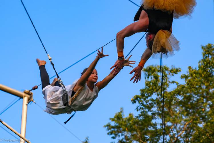 Hilltown Youth Recovery Theatre participants rehearse for their summer performance of “A Midsummer Night’s Dream.” The performance included trapeze work and aerial silk displays.