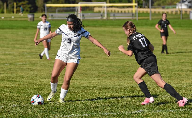 Franklin Tech’s Zoey Duda (3) readies to take a shot while defended by Pioneer’s Lily LaPrade (17) during the teams’ 0-0 tie in season-opening Bi-County League action on Wednesday in Northfield.