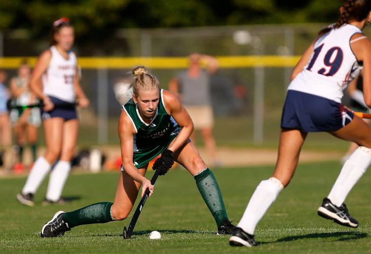 Greenfield’s Gloria McDonald (5) clears the ball downfield against Frontier in the fourth quarter Wednesday in South Deerfield.