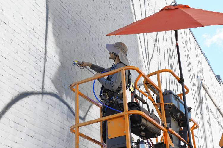 Muralist Darion Fleming of Charlotte, North Carolina, has started working on his mural on the side of the Shea Theater Arts Center in Turners Falls.