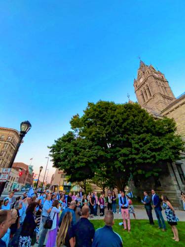 More than 50 people participated in the vigil outside Holyoke’s City Hall Thursday.