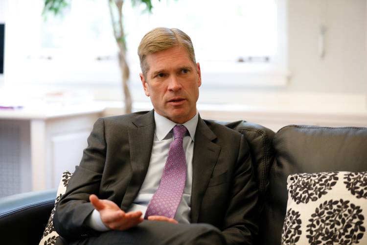 “All colleges and universities are evaluating the outcomes of this first admission cycle under the new legal standard,” reads a late August letter sent to the campus community by Amherst College President Michael A. Elliott, pictured in his office at Converse Hall, along with Dean of Admission and Financial Aid Matthew L. McGann, Chief Equity and Inclusion Officer Sheree M. Ohen, and Chief Student Affairs Officer and Dean of Students Angie Tissi-Gassoway.