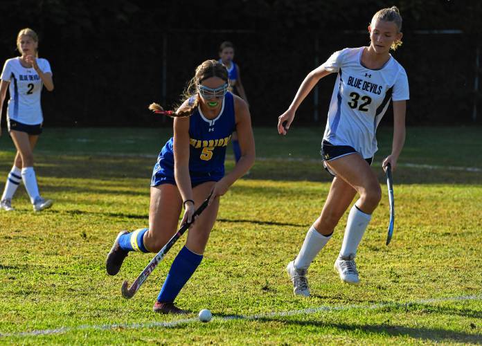 Mohawk Trail’s Avery Johnston carries the ball against Northampton during Valley League field hockey action on Wednesday in Northampton.