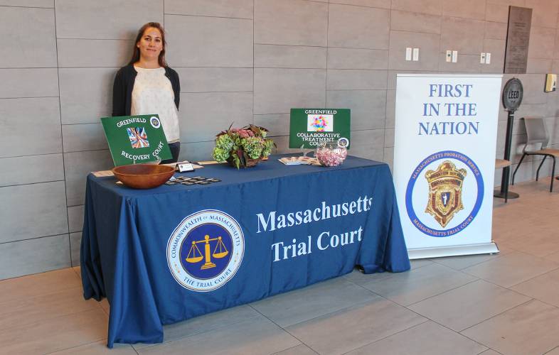 Leigh Faulkner, Greenfield District Court’s probation office manager, set up a table at the Community Resource Fair at the Franklin County Justice Center on Thursday to highlight the Greenfield Recovery Court, for people with substance use disorder, and the Collaborative Treatment Court, for those with mental health issues.