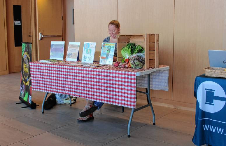 Emily Chiara, program manager at Just Roots, set up a table at the Community Resource Fair at the Franklin County Justice Center on Thursday to share information about a few of the nonprofit’s programs.