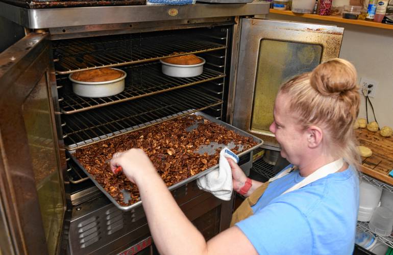 Lucy Damkoehler of Sweet Lucy’s Bakeshop in Bernardston stirs her sweet and spicy nuts. They can be enjoyed plain or used to add crunch to salads or to top off a festive pumpkin pie.