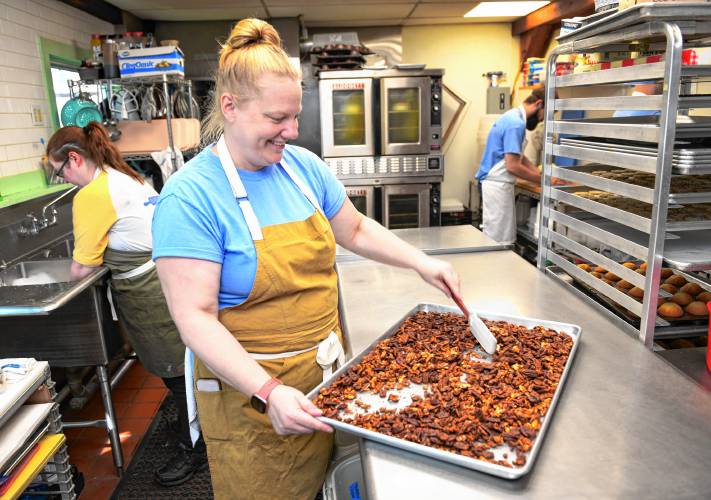 Lucy Damkoehler of Sweet Lucy’s Bakeshop in Bernardston stirs her sweet and spicy nuts. They can be enjoyed plain or used to add crunch to salads or to top off a festive pumpkin pie.