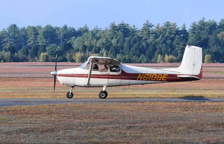 Tracking dogs and their handlers in a Cessna 172 owned and flown by pilot Chris Lucia at the Orange Municipal Airport. The event was organized by the Northeast Houndsmen to get the dogs used to the sounds and feel of flying in a small plane. 