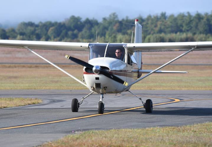 Pilot Chris Lucia gave tracking dogs rides at the Orange Municipal Airport on Monday. The event was organized by the Northeast Houndsmen to get the dogs used to the sounds and feel of flying in a small plane. 