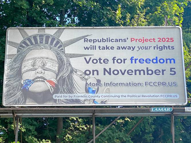 Franklin County Continuing the Political Revolution’s billboard at the corner of Bank Row, Deerfield Street and Mill Street in Greenfield.