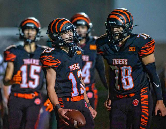 South Hadley’s Noah Hambley (13) celebrates a touchdown against Greenfield during the first half of their high school football game at South Hadley on Friday.