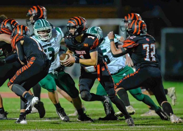 South Hadley’s Griffin Soderbaum, carries the ball against Greenfield during the first half of their high school football game at South Hadley on Friday.