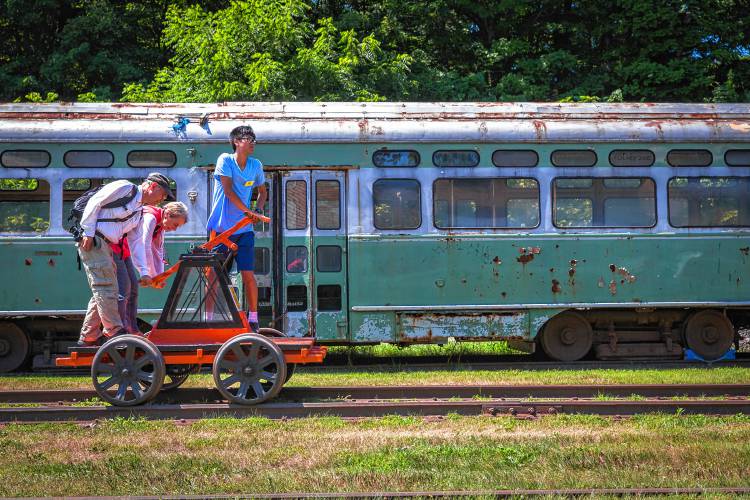 Visitors to the Shelburne Falls Trolley Museum ride the pump car during the 2016 Trolleyfest. The event returns on Saturday, Sept. 28.