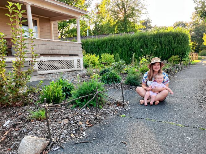 Olivia Cather enjoys designing and implementing numerous garden projects on the Greenfield property she and her husband, Wil, purchased in 2022. Despite being busy, doting parents of baby Dottie, the couple has accomplished a great deal in just two years, transforming spaces, growing food and flowers, and fostering beauty in their Forest Avenue neighborhood.