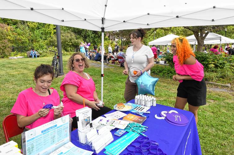 From left, Olivia Cushing, her mother RECOVER Project Director Abbi Cushing, Kristen Ballentine of Greenfield and RECOVER Project peer support coach Sarah Rashad at The RECOVER Project’s celebration of National Recovery Month at Energy Park in Greenfield on Friday, Sept. 20.