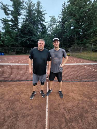 Jared Berthiaume and Sam Thomson after winning the Greenfield Tennis Assocation Doubles League finals on Wednesday.