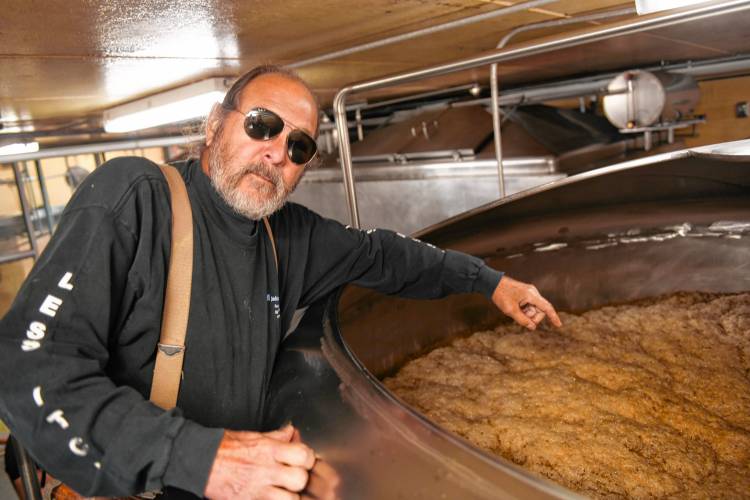 Co-founder and President Gary Bogoff with some fermenting beer at Berkshire Brewing Co. in South Deerfield.