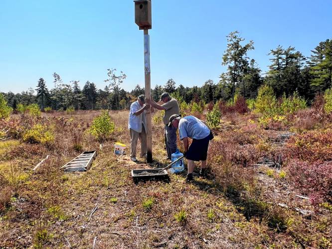 Jeff Johnstone, Ernie LeBlanc, Bob Mallet and Dave Small (not pictured) installed an American kestrel nest box at the Birch Hill Wildlife Management Area in Winchendon.