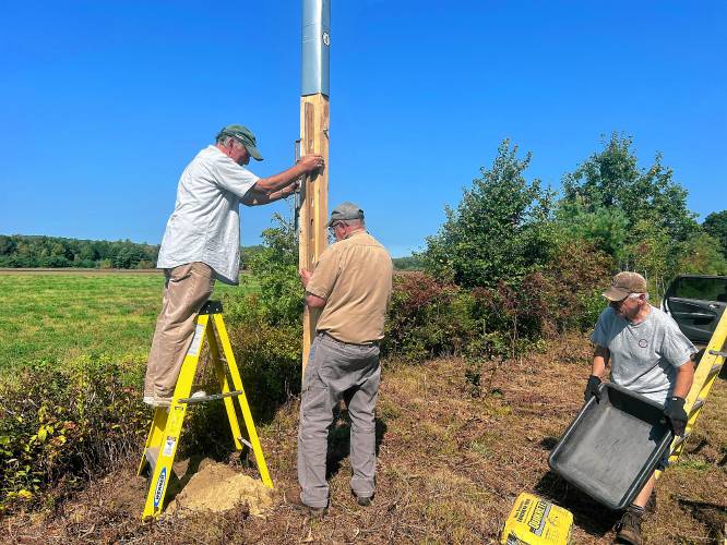 Jeff Johnstone, Ernie LeBlanc, Bob Mallet and Dave Small (not pictured) installed an American kestrel nest box near Seaman Paper Co. in Orange.