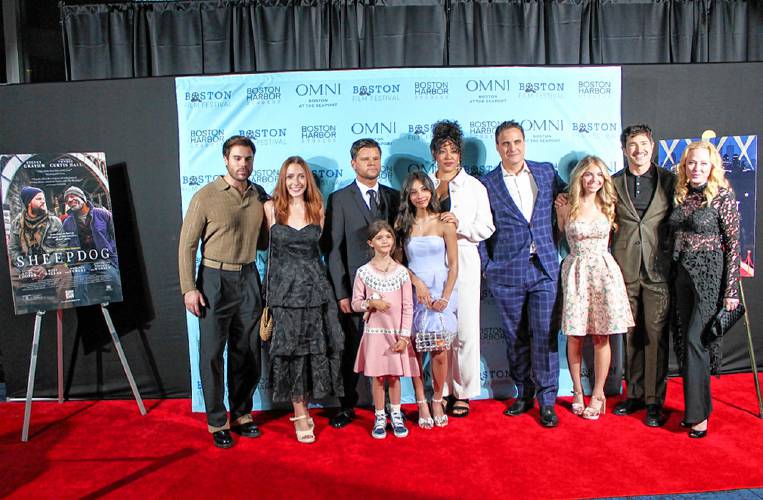 The cast of the film “Sheepdog” on the red carpet at the Simons Theater during the opening night of the 40th Annual Boston Film Festival. Pictured left to right is Josh Riley, Kayla Caufield, Steven Grayhm, Rose Malick, Nathalie Sepulveda, Lilli Cooper, Dominic Fumusa, Rhys Olivia Cote, Matt Dallas and Virginia Madsen.