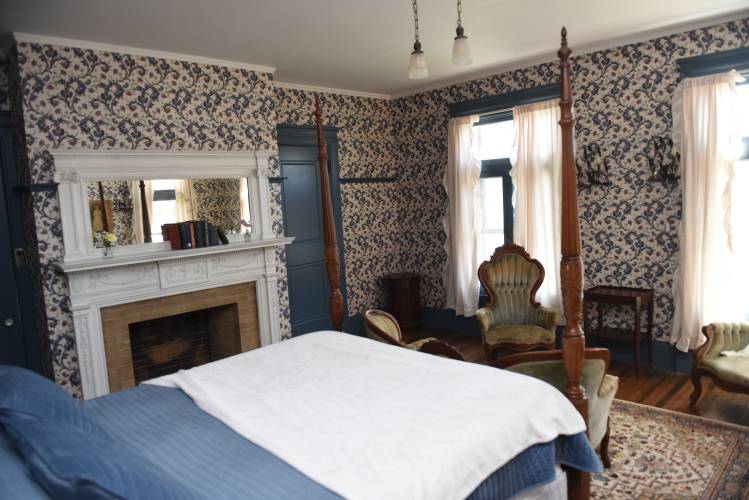 A bedroom in the Revival Wheeler Mansion in Orange. 