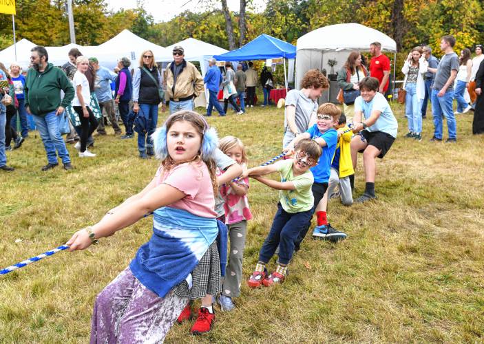 Children participate in the “Tug of Garlic” at the North Quabbin Garlic and Arts Festival in Orange on Sunday afternoon.