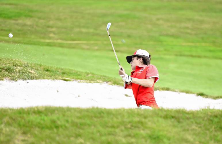 Hampshire’s Ashton Lashway gets out of the green-side bunker on the ninth hole during the PVIAC Boys Golf Two-Ball Invitational at Cold Spring Country Club in Belchertown on Monday afternoon.