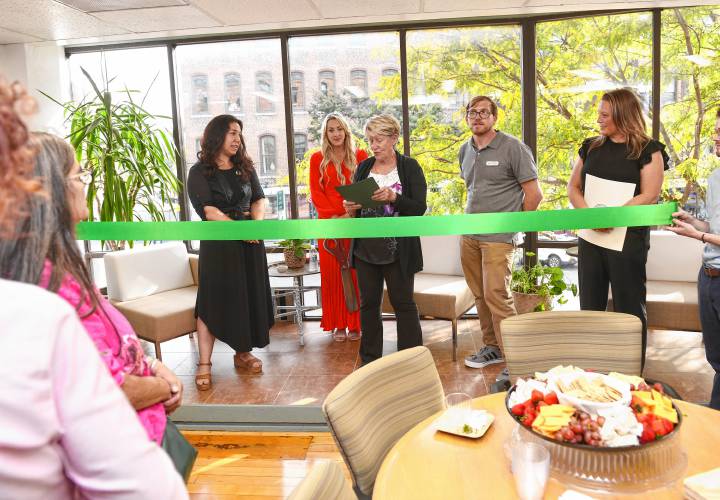 From left, Greenfield Business Association Director Hannah Rechtschaffen, Franklin County Chamber of Commerce Executive Director Jessye Deane, Greenfield Mayor Ginny Desorgher, GBA board of directors Co-President Dan Piasecki and state Rep. Natalie Blais during a ribbon-cutting ceremony for the GBA’s new offices at 278 Main St. in Greenfield on Friday.