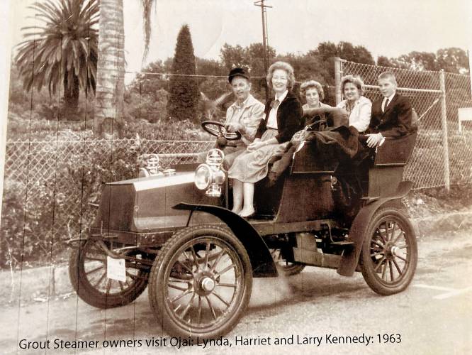 In this 1963 photo taken in California, Larry Grout Kennedy is pictured at far right as a teenager, seated in one of the Grout automobiles his ancestors had famously manufactured at the turn of the 20th century in Orange.