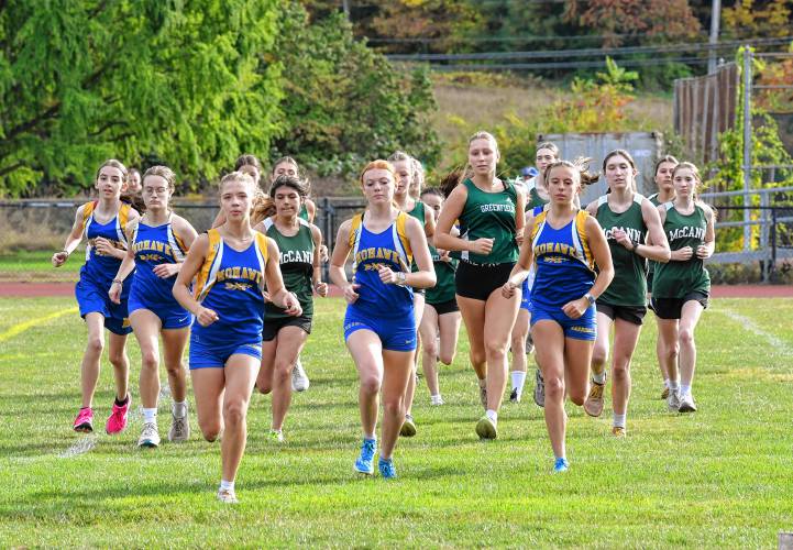 The start of the girls cross country meet between Mohawk, McCann and Greenfield at Mohawk Trail Regional School earlier this season. 