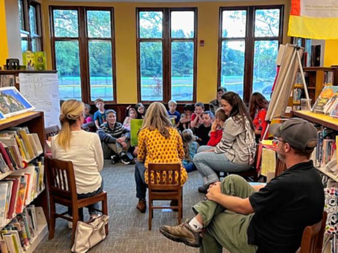 Families were welcomed to the Sunderland Public Library Tuesday afternoon to meet Leverett-based author and illustrator Micha Archer and celebrate Title I grant funding for the district, which provides extra support to a select group of students with learning goals — in Union 38’s case, reading goals.