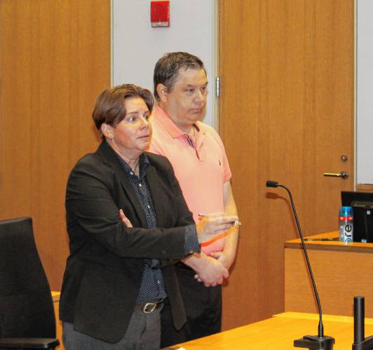 Defense attorney Emily Shallcross speaks to Judge Jane Mulqueen while standing next to her client, Timothy M. Erikson, who on Thursday pleaded guilty in Franklin County Superior Court to five counts of indecent assault and battery on a child under 14, two counts of rape and abuse of a child under 16 years of age, and one count of furnishing alcohol to a person under 21 years of age.