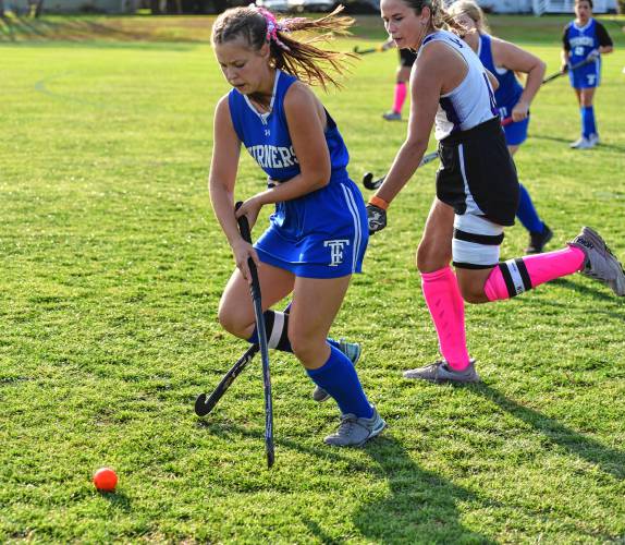 Turners Falls’ Ella Guidaboni (5) maneuvers around a Smith Academy defender during the first half of a 2-1 loss on Thursday afternoon in Hatfield.