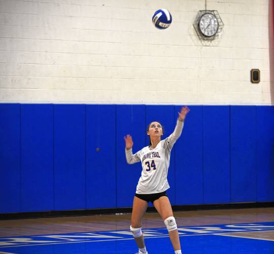 Mohawk Trail's Jade Wheeler serves against Turners Falls earlier this season.