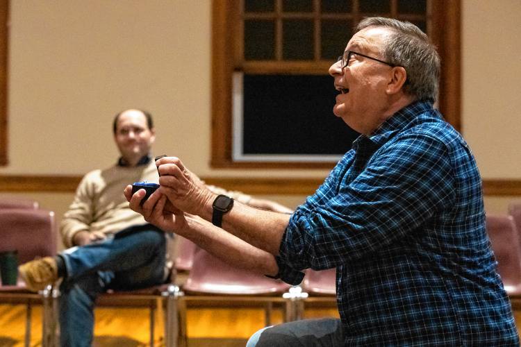 Jim Merlin rehearses Valley Players’ production of “Constellations” at Munson Memorial Library in Amherst.