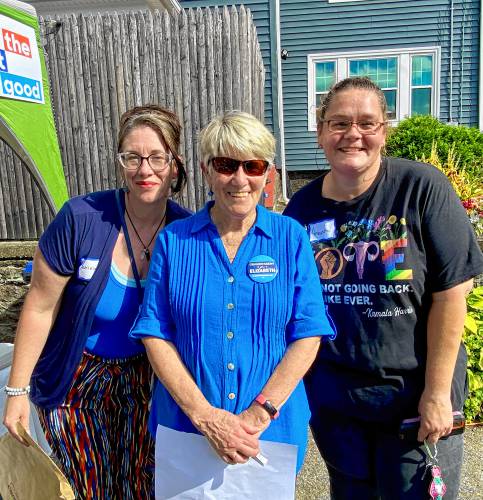 Ashleigh Young, left, and Amanda Brown, seen here with Greenfield Mayor Ginny Desorgher, have planned a “Show Up and Stand Out” event for the Greenfield Common on Oct. 19 to advocate for the Democratic Party and its principles ahead of the November election.