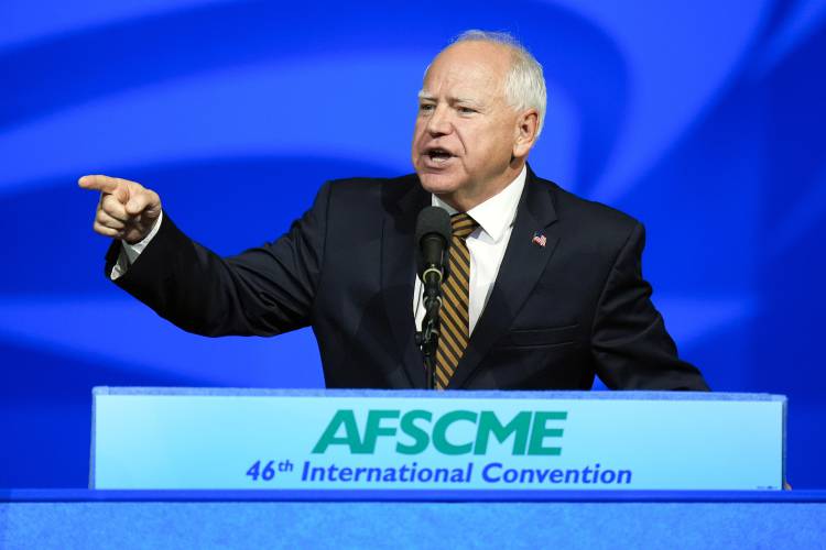 Democratic vice presidential nominee Minnesota Gov. Tim Walz speaks at the American Federation of State, County and Municipal Employees (AFSCME) Convention in Los Angeles on Aug. 13. Two Franklin County women, Amanda Brown and Ashleigh Young, are organizing an Oct. 19 standout on Greenfield Common to advocate for the Democratic Party and its principles ahead of the November election.