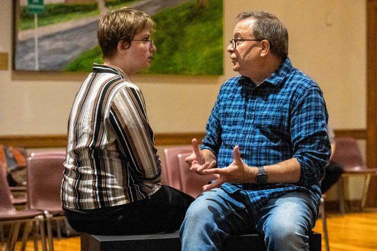 Sam Fox and Jim Merlin rehearse Valley Players’ production of “Constellations” at Munson Memorial Library in Amherst.