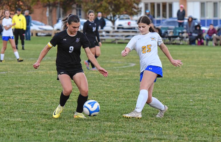 Gateway’s Kathryn Harding (25) makes a pass around Pioneer’s Dani Teaca (9) during the first half of the Gators’ 00-00 loss to the Panthers on Thursday afternoon in Northfield.