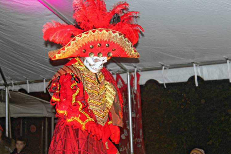 Daniel Ziarnik-Case created an elaborate outfit, loosely inspired by a matador’s costume. It included bright red and gold fabrics, sequins and sparkles, and was complete with a grand feathered cap an skull mask. 